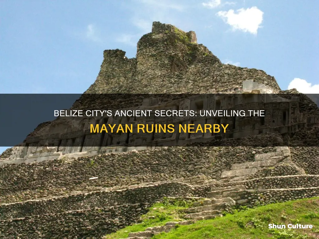 how far are mayan ruins from belize city