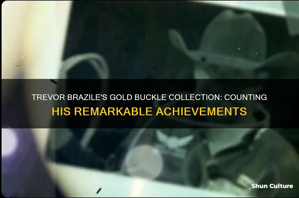 how many gold buckles does trevor brazile have