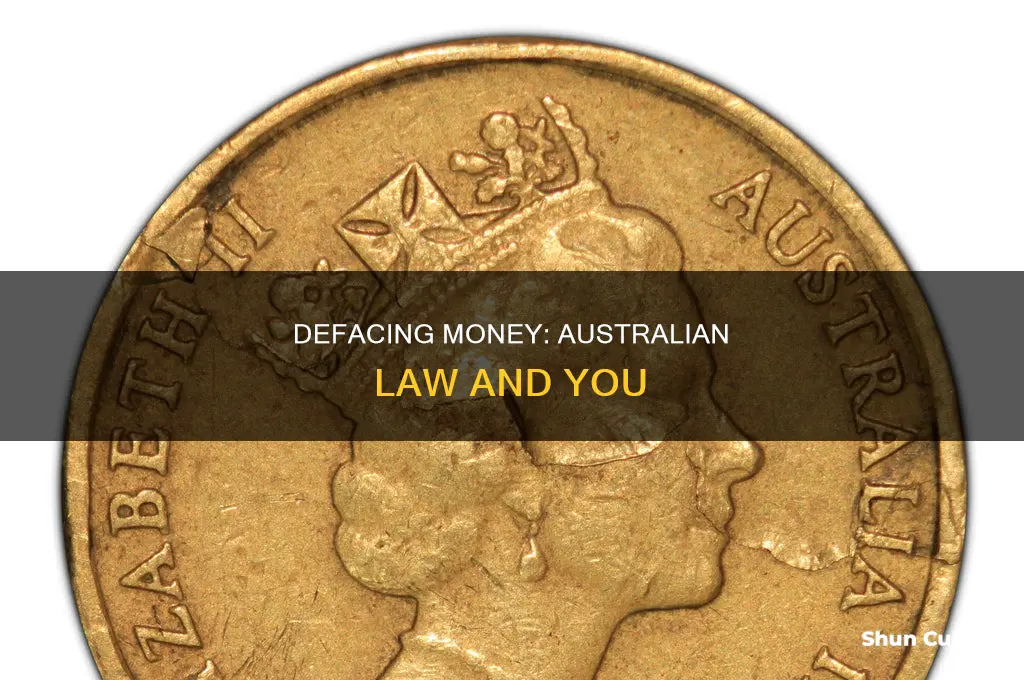 is it illegal to deface money in australia