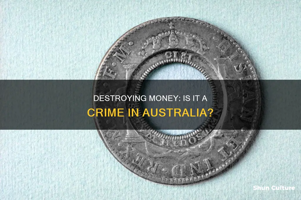 is it illegal to destroy money in australia