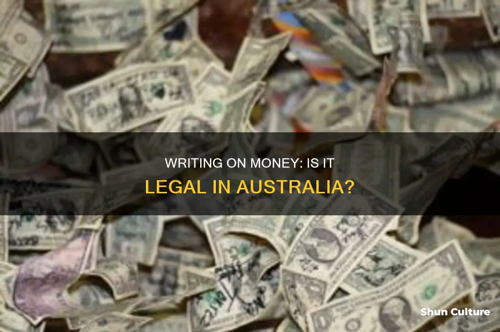is it illegal to write on money in australia