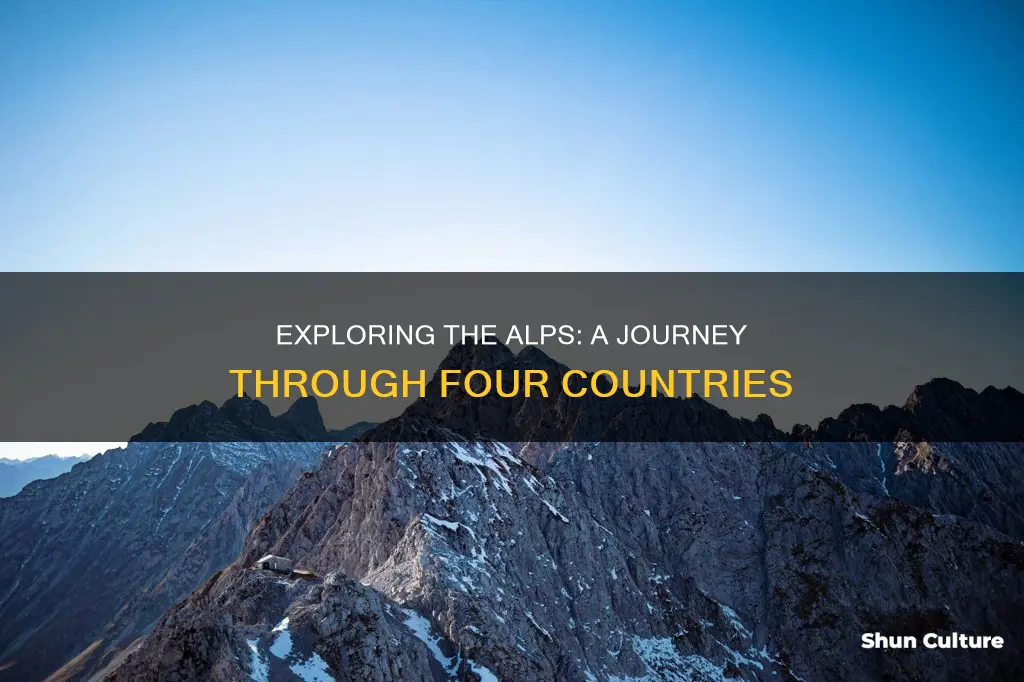 what mountain chain runs through switerland austria france and italy