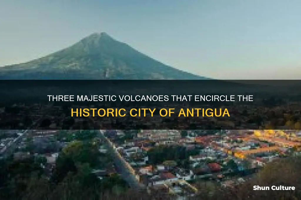 which 3 volcanoes surround the city of antigua